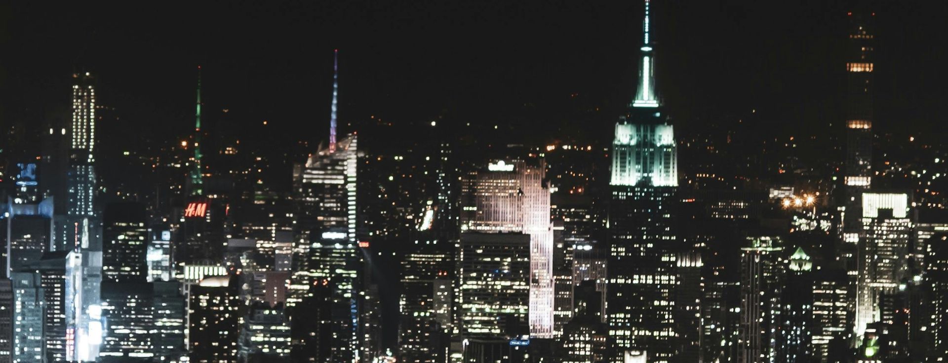 Bird's-eye View Photography of High Rise Building during Night Time